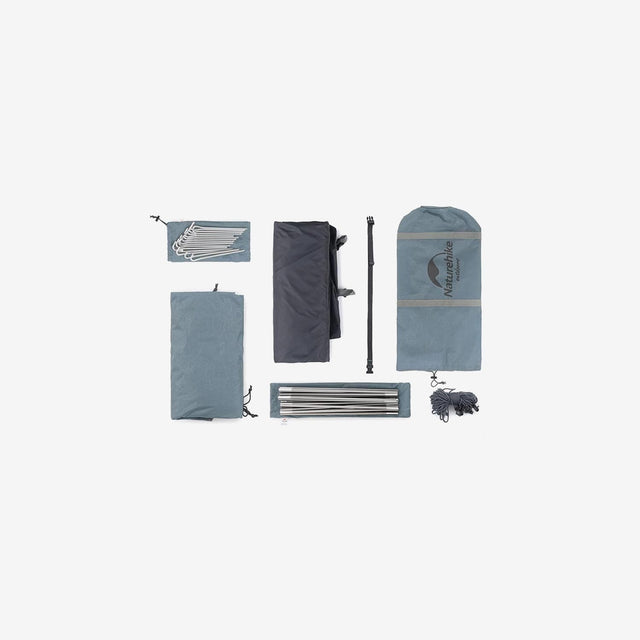 Tent packed into carry bag with poles and stakes