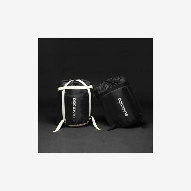 BLACK DOG sleeping bag folded and packed into a travel pouch