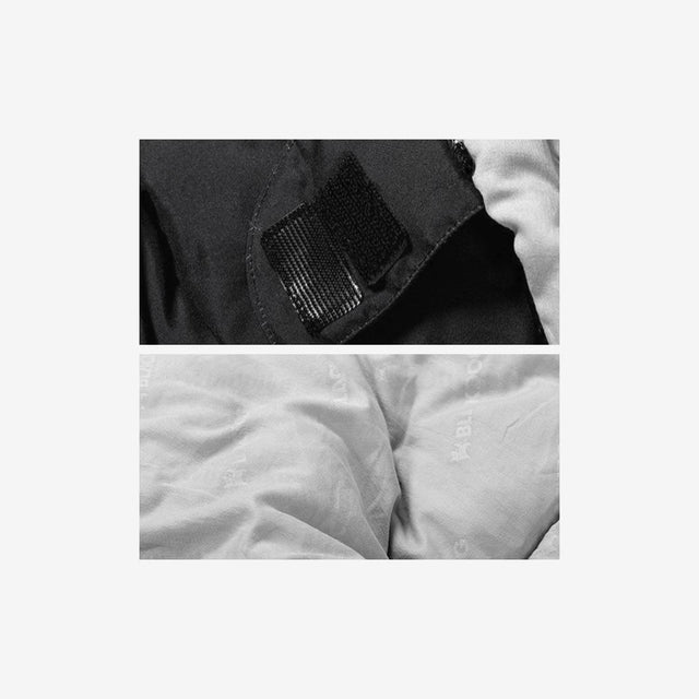 BLACK DOG Side view of hooded trapezoid sleeping bag showing wide footbox and hood