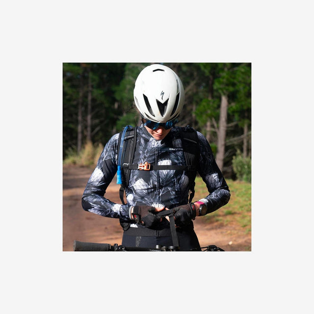 Cyclist wearing Naturehike Cielo backpack on a mountain trail