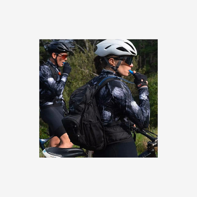 Cyclist wearing Naturehike Cielo backpack on a mountain trail