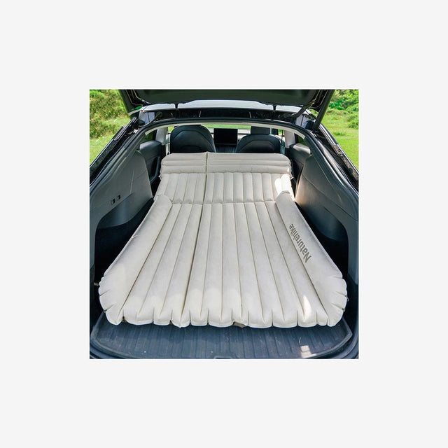 Side view of car mattress inflated across rear seats