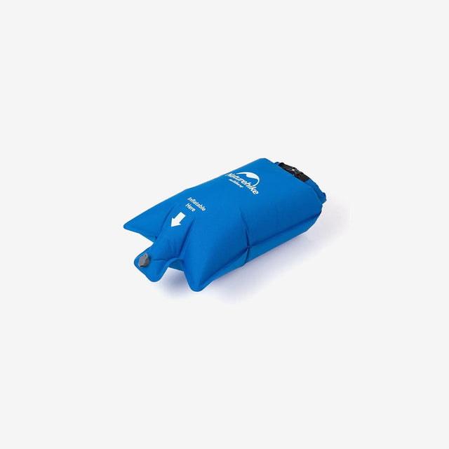 Side view showing the inflator dry bag's rolled top and buckle system