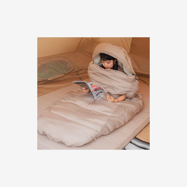 Camper sleeping in a Naturehike oval sleeping bag