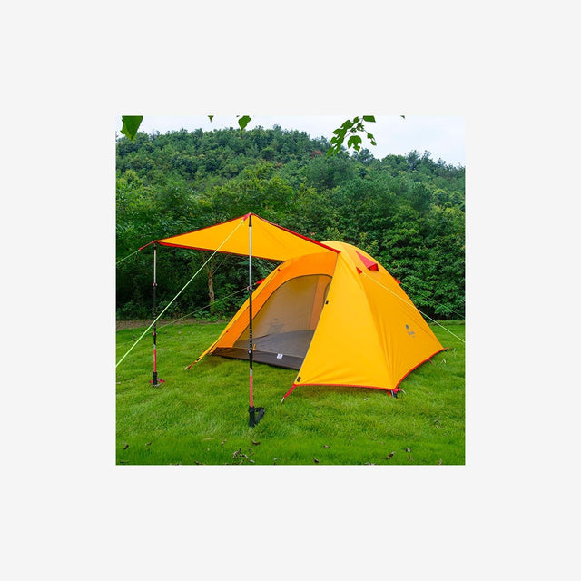 Campers setting up the P Series 3P tent at a campsite in forest or mountain area