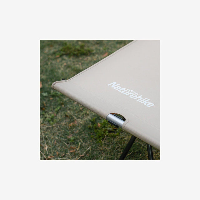 Close-up of anti-tear fabric, folding frame mechanism, and reinforced carrying handles