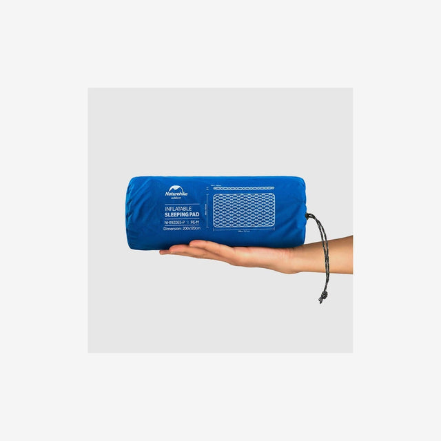 FC-11 sleeping pad rolled and packed into a large carry sack